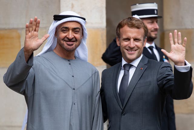 <p>French President Emmanuel Macron (R) greets and Crown Prince of Abu Dhabi and Deputy Supreme Commander of the UAE Armed Forces, Sheikh Mohamed bin Zayed Al Nahyan</p>