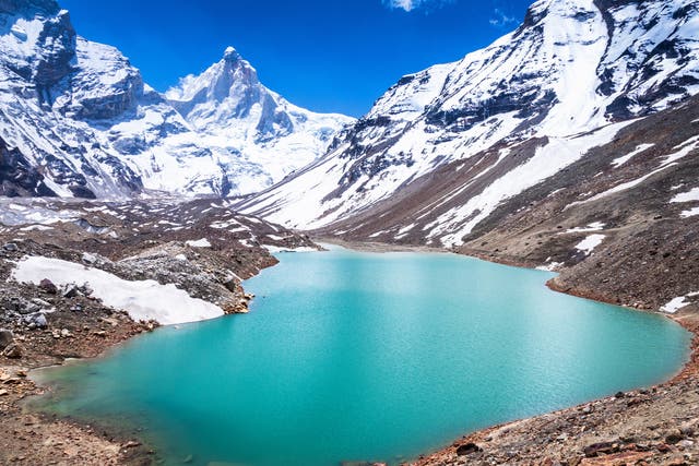 <p>A glacial lake in the Himalayas near Mount Thalay Sagar. There is a third more ice in the glaciers of the Himalayas than previously estimated, scientists have said</p>