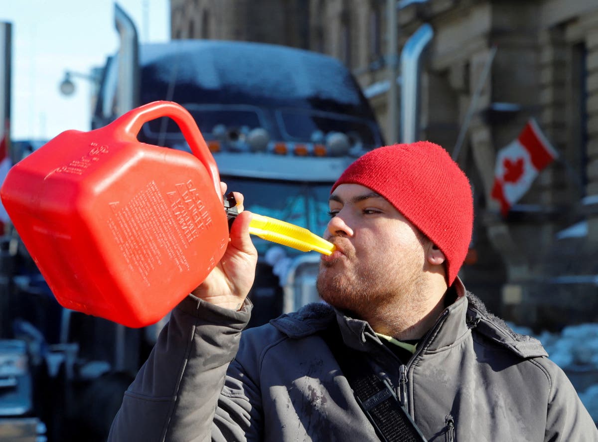 Canadian truckers block off Michigan border bridge as protest against vaccine mandates hits day 11