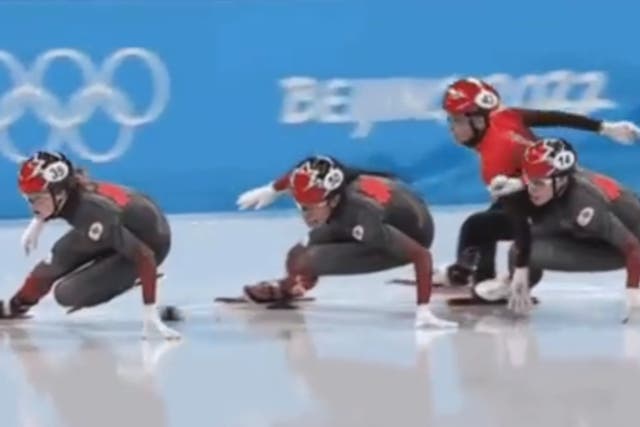 <p>The moment when Kexin Fan appeared to flick a marker on ice rink towards Canada’s Alyson Charles</p>