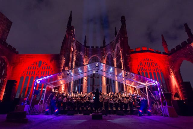 <p>The choir performs during a Ghosts in the Ruins dress rehearsal at Coventry cathedral</p>
