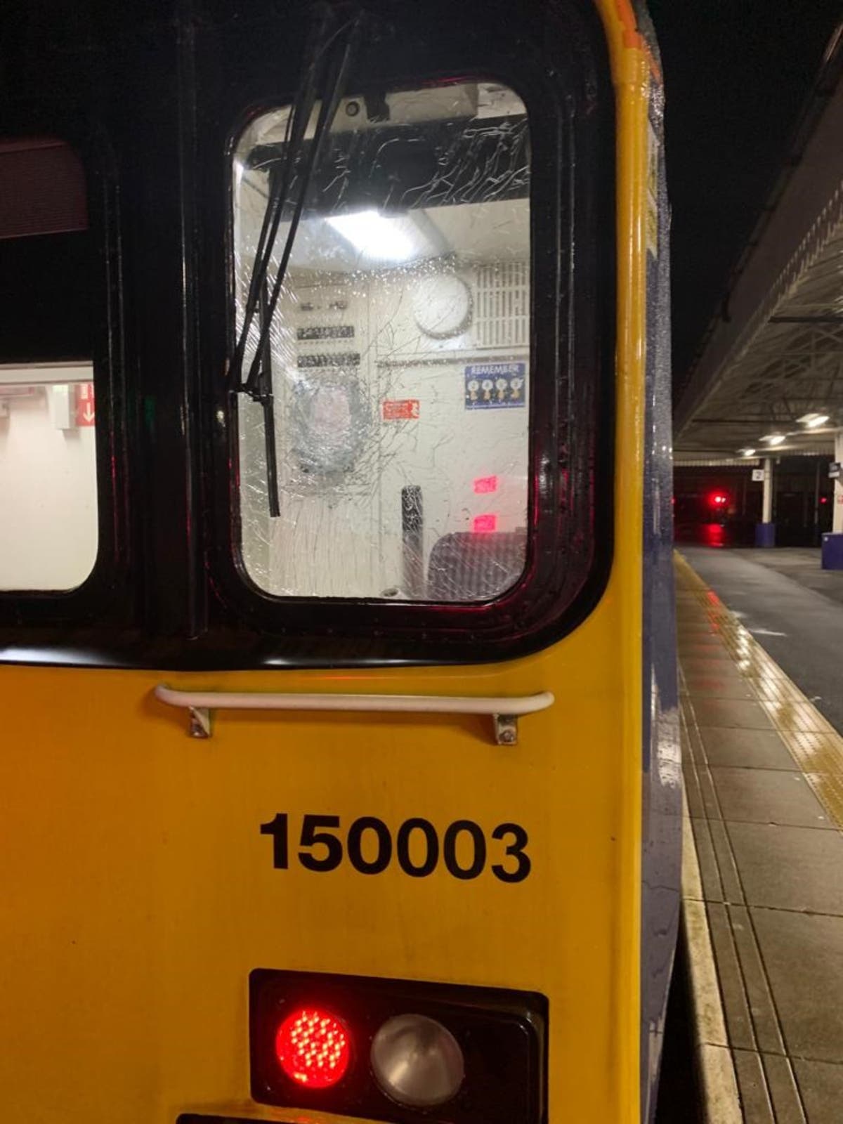 Driver injured as brick thrown at train