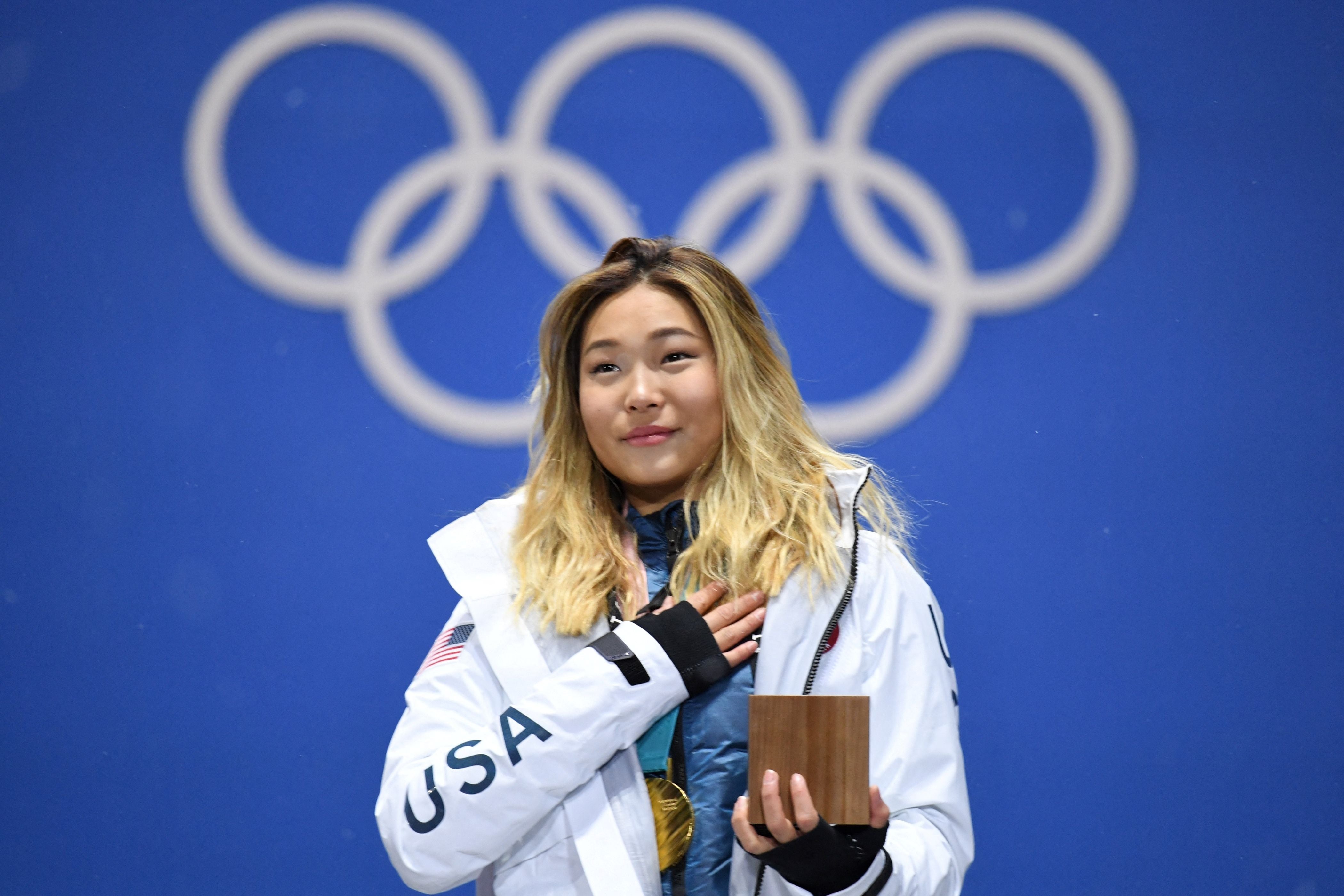 Chloe Kim poses after winning gold in the women’s halfpipe at Pyeongchang 2018