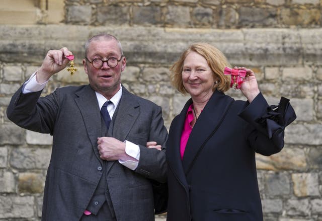 Chefs Margot and Fergus Henderson from London with their OBEs (Officers of the Order of the British Empire) following an investiture ceremony by the Prince of Wales at Windsor Castle (Seve Parsons/PA)