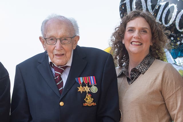 <p>Sir Captain Tom Moore with his daughter, Hannah Ingram-Moore, the interim CEO of the Captain Tom Foundation </p>