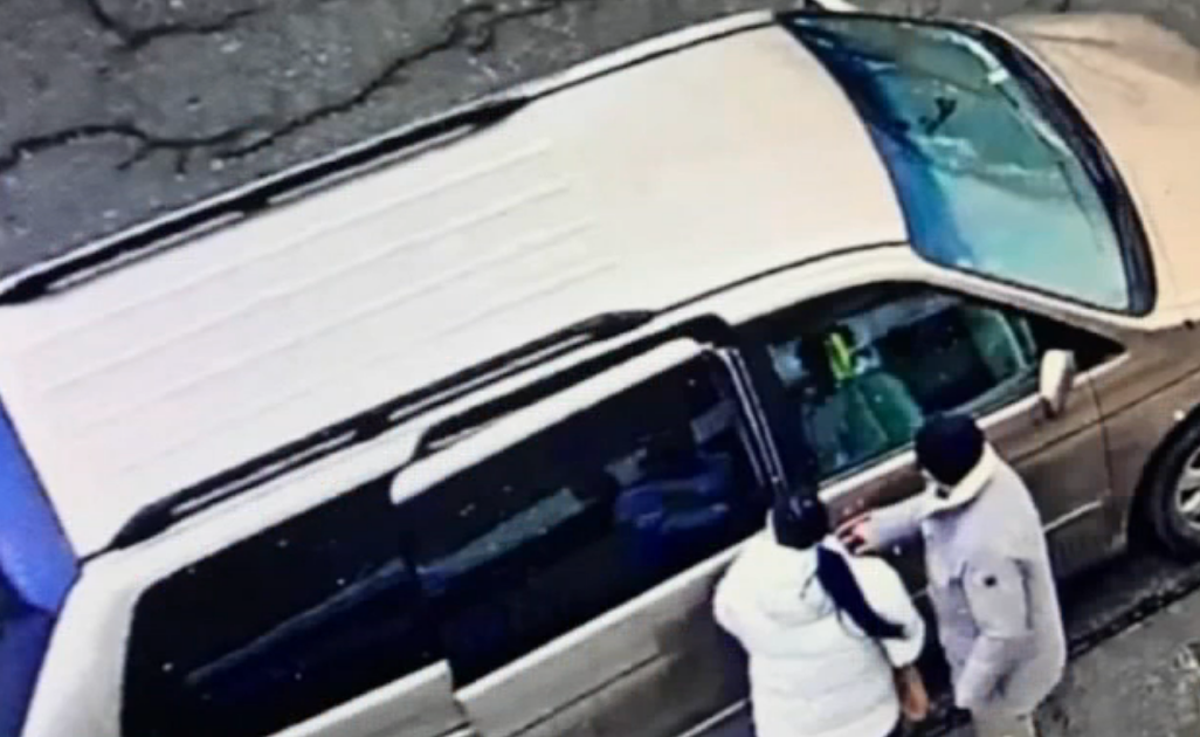 Man seen stealing woman&rsquo;s Louis Vuitton purse as she helps disabled child
