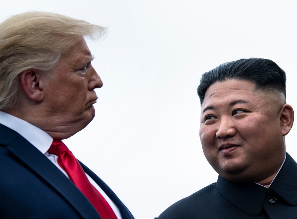 <p>US president Donald Trump and North Korea’s leader Kim Jong-un talk before a meeting in the Demilitarized Zone(DMZ) on June 30, 2019, in Panmunjom, Korea</p>