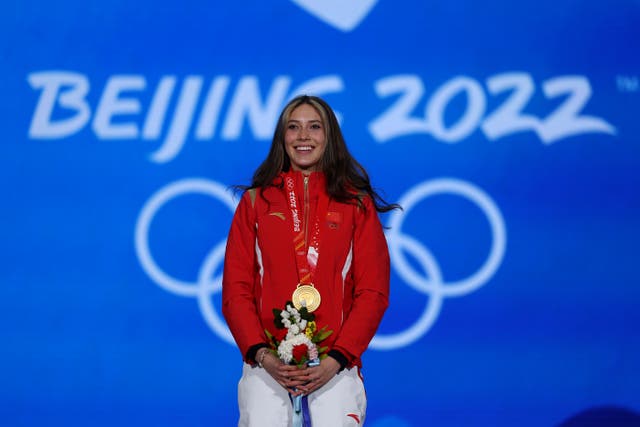 <p>Gold medallist Ailing Eileen Gu of Team China celebrates with their medal during the Women's Freestyle Skiing Freeski Big Air medal ceremony on Day 4 of the Beijing 2022 Winter Olympic Games at Beijing Medal Plaza on February 08, 2022 in Beijing, China. </p>