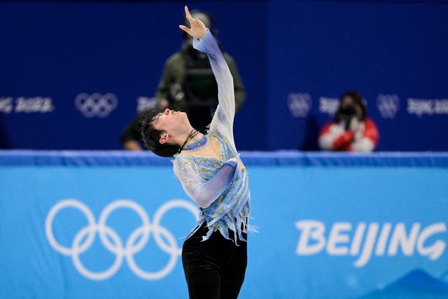 <p>Japan's Yuzuru Hanyu competes in the men's single skating short program of the figure skating event during the Beijing 2022 Winter Olympic Games at the Capital Indoor Stadium in Beijing </p>