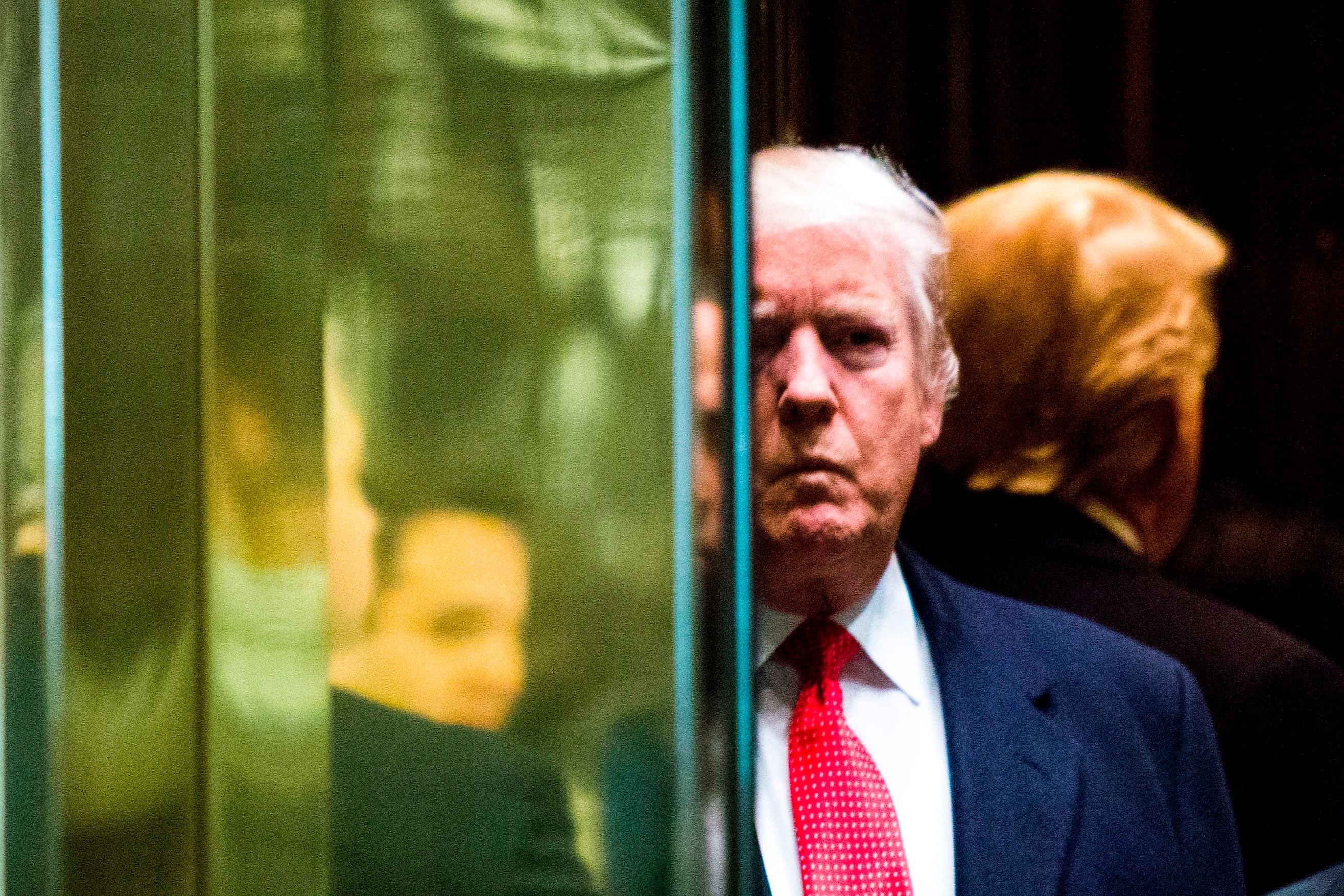 Donald Trump descended the elevator to enter the atrium at one of the Trump Towers ahead of announcing his presidential ambition in 2015
