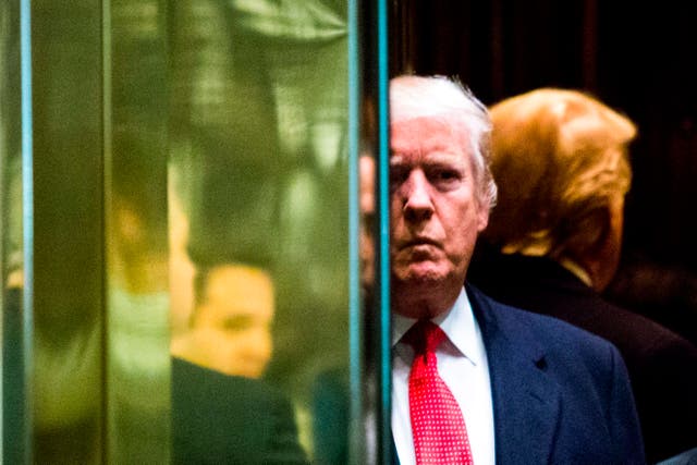 <p>Donald Trump descended the elevator to enter the atrium at one of the Trump Towers ahead of announcing his presidential ambition in 2015 </p>