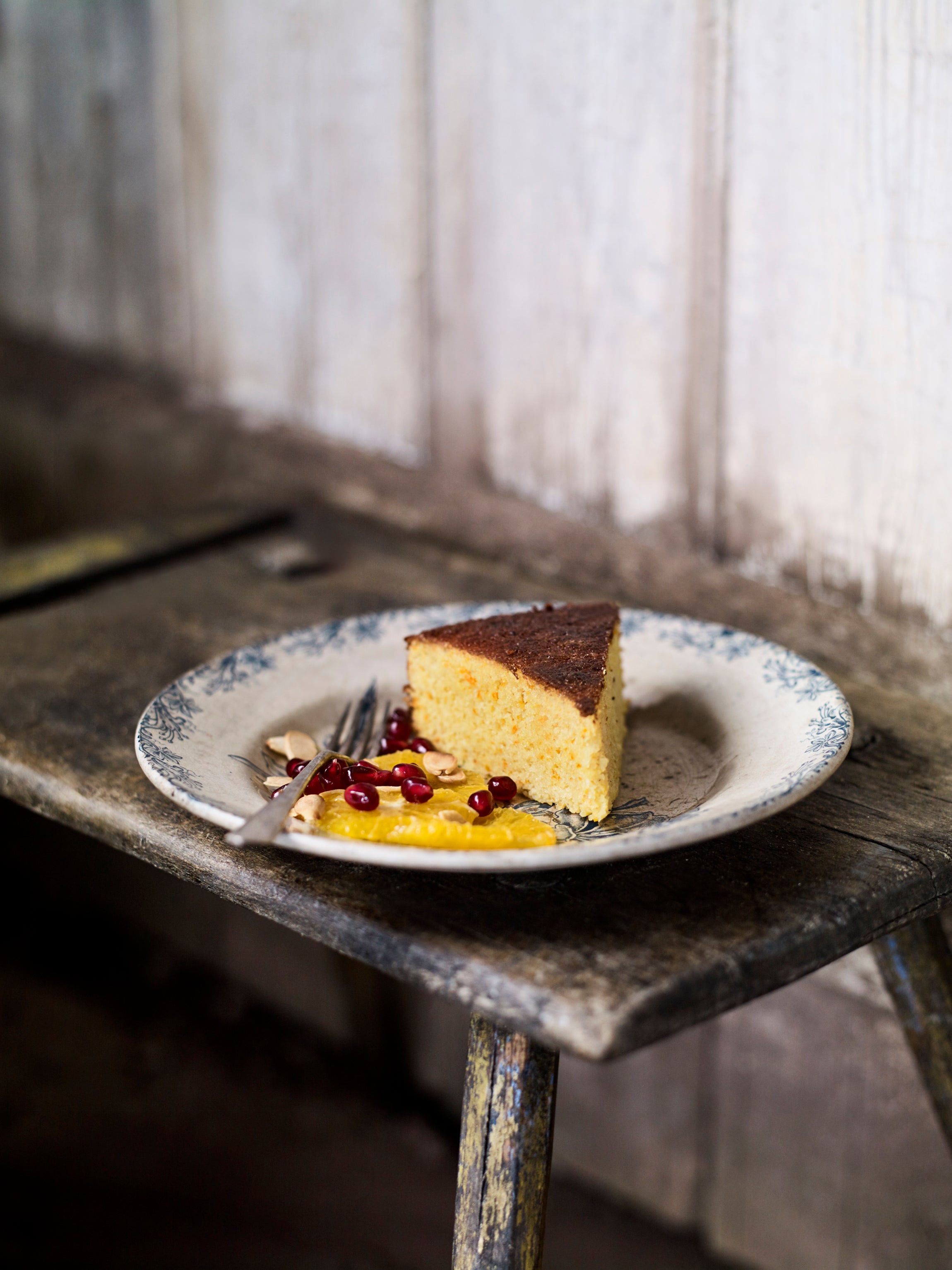 Clementine cake with an orange and pomegranate salad from Recipes From The Farm (Andrew Montgomery/PA)