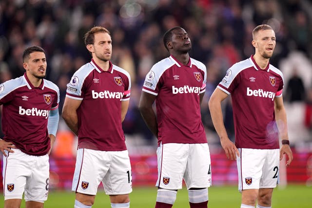 <p>West Ham’s Kurt Zouma (second from right) lines up ahead of the Premier League match against Watford</p>