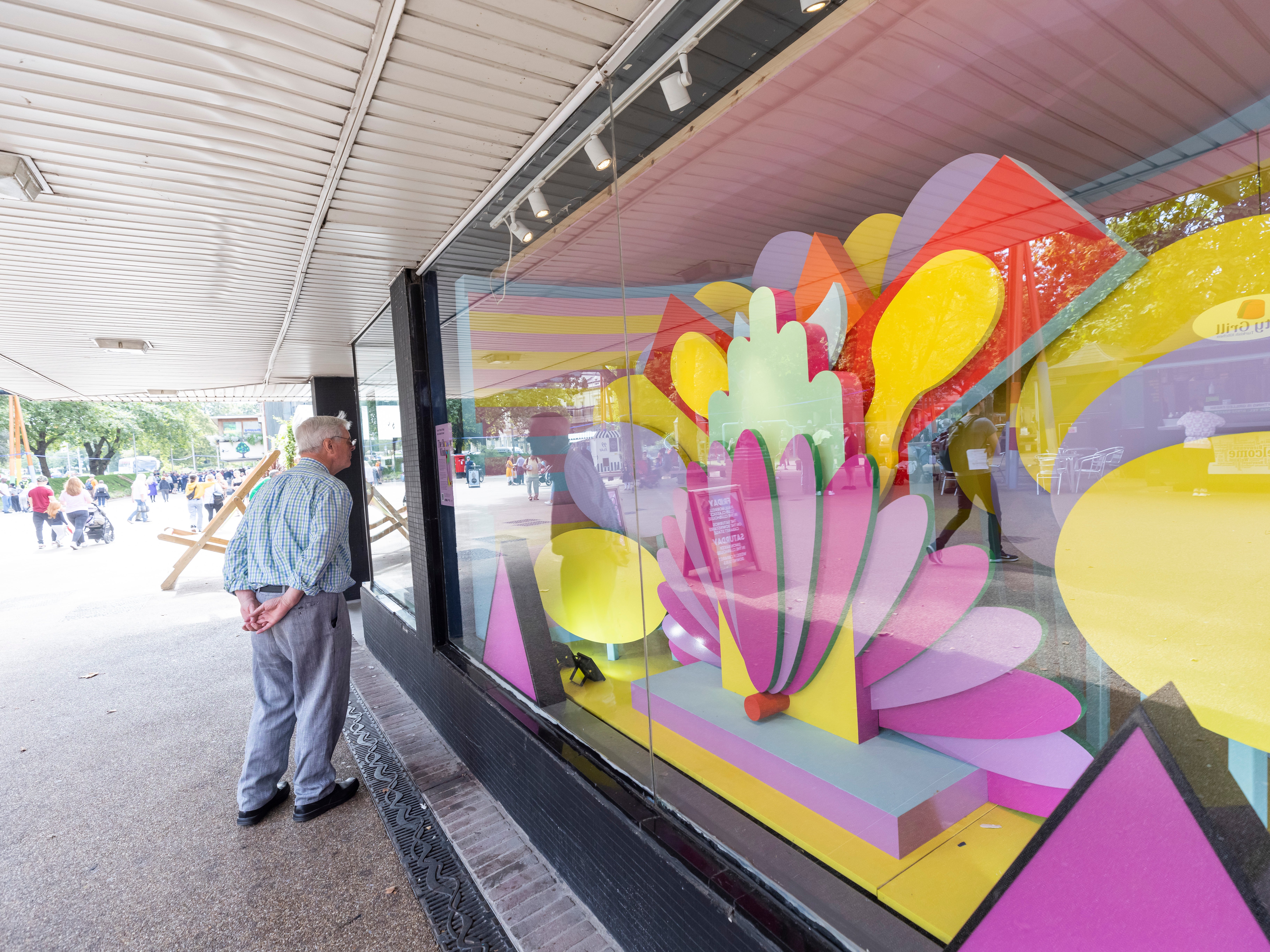 In store windows, shoppers are confronted with artworks such as ‘Phoenix Priding’ by Adam Nathaniel Furman