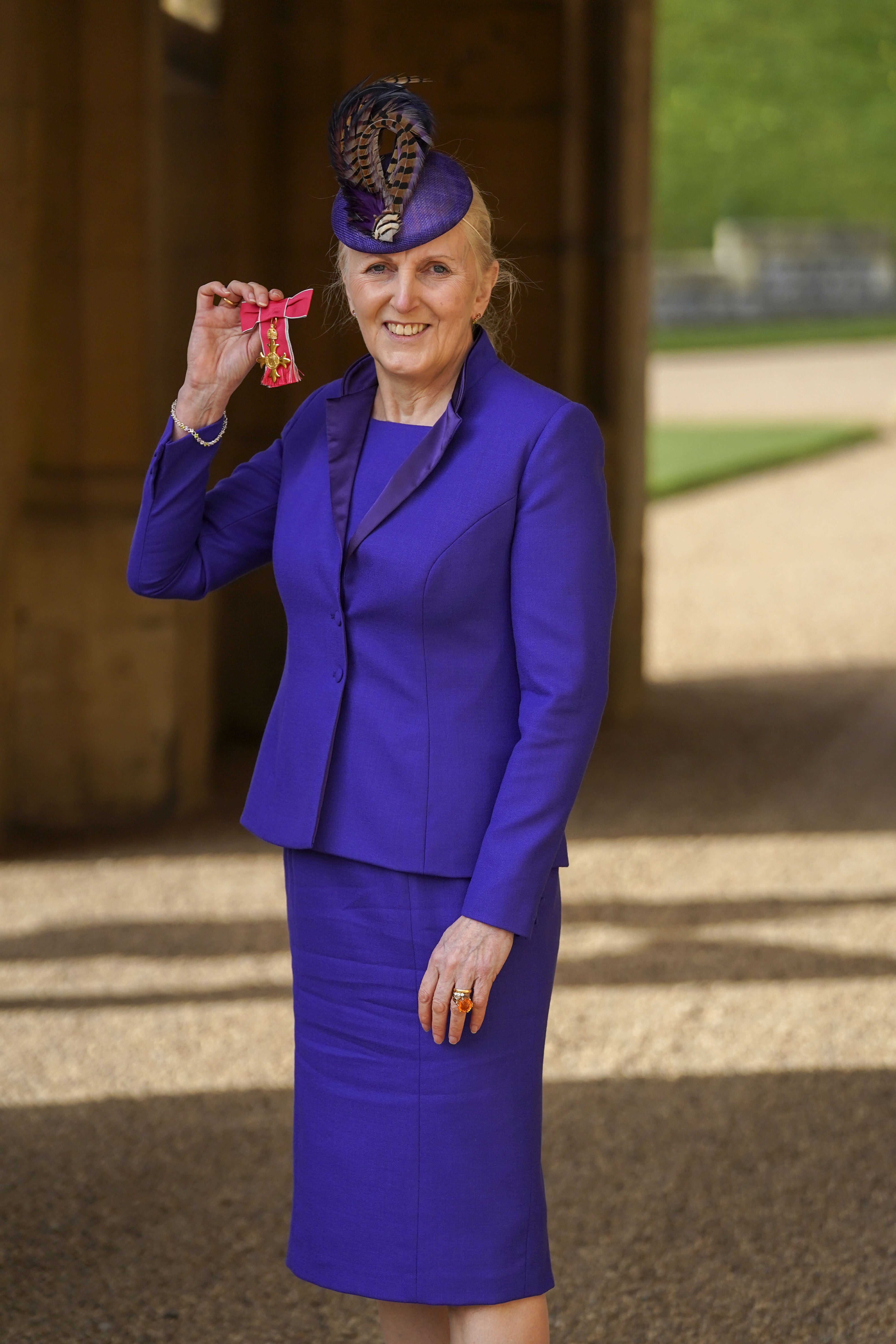 Angela Owen with her OBE (Steve Parsons/PA)