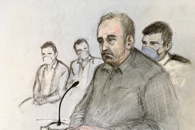 Court artist sketch of Ian Stewart giving evidence, watched by his two sons (left), at Huntingdon Crown Court (Elizabeth Cook/PA)