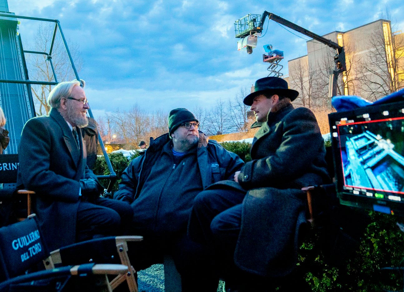 Richard Jenkins (left), filmmaker Guillermo del Toro and Bradley Cooper on the set of ‘Nightmare Alley’