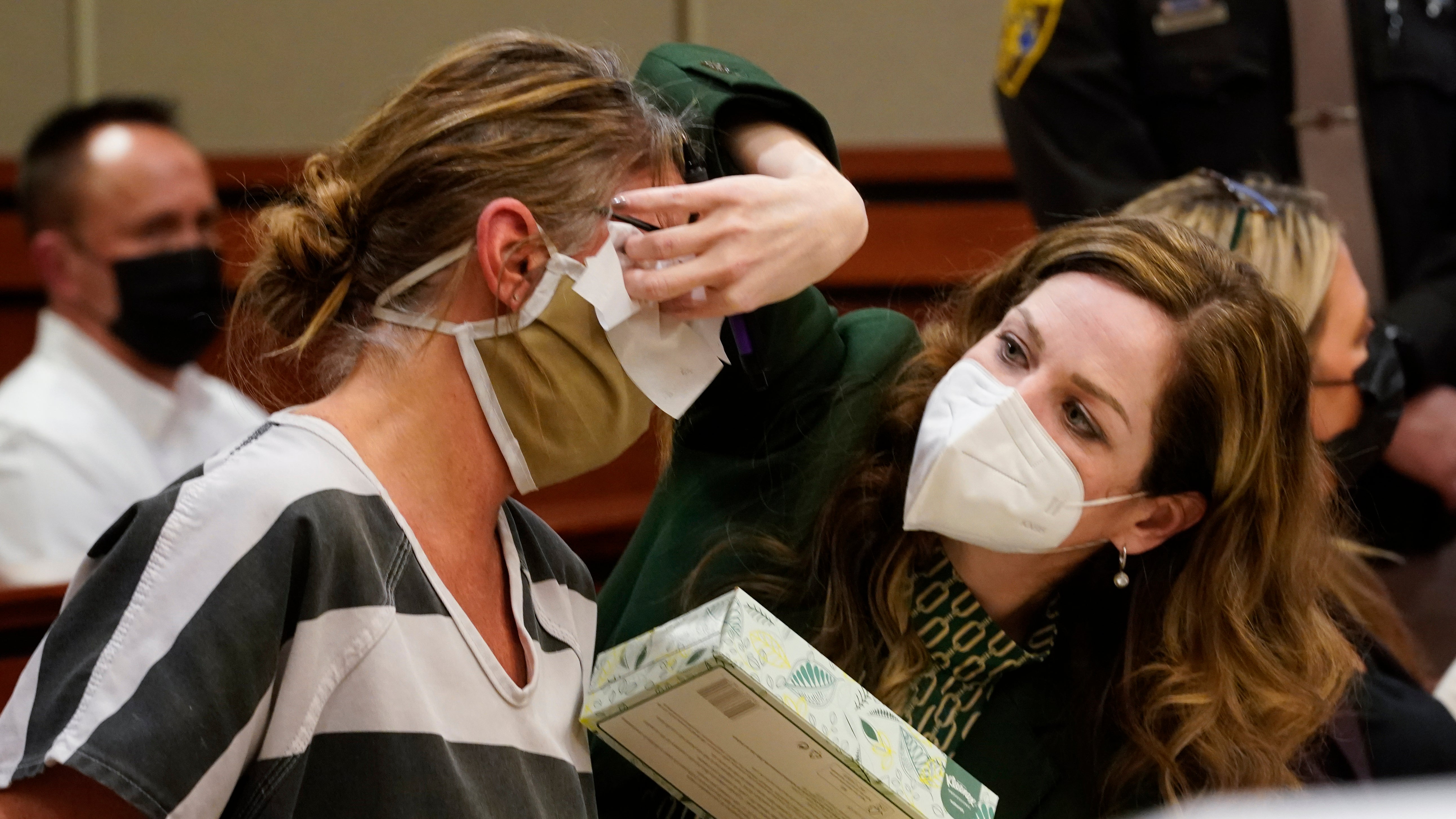 Jennifer Crumbley’s attorney wipes tears from her eyes as she breaks down listening to the 911 call