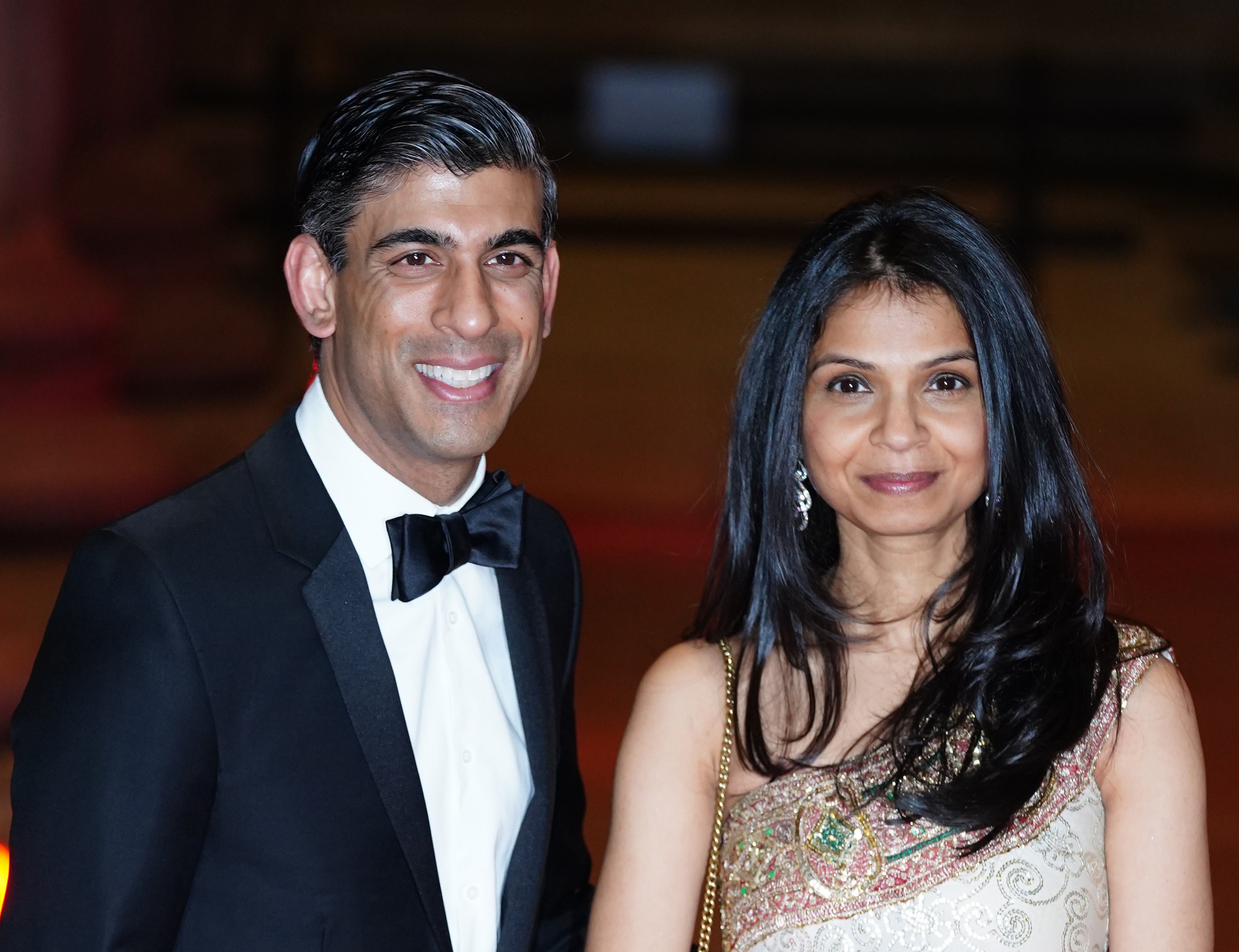 Rishi Sunak and his wife Akshata Murthy attend a reception