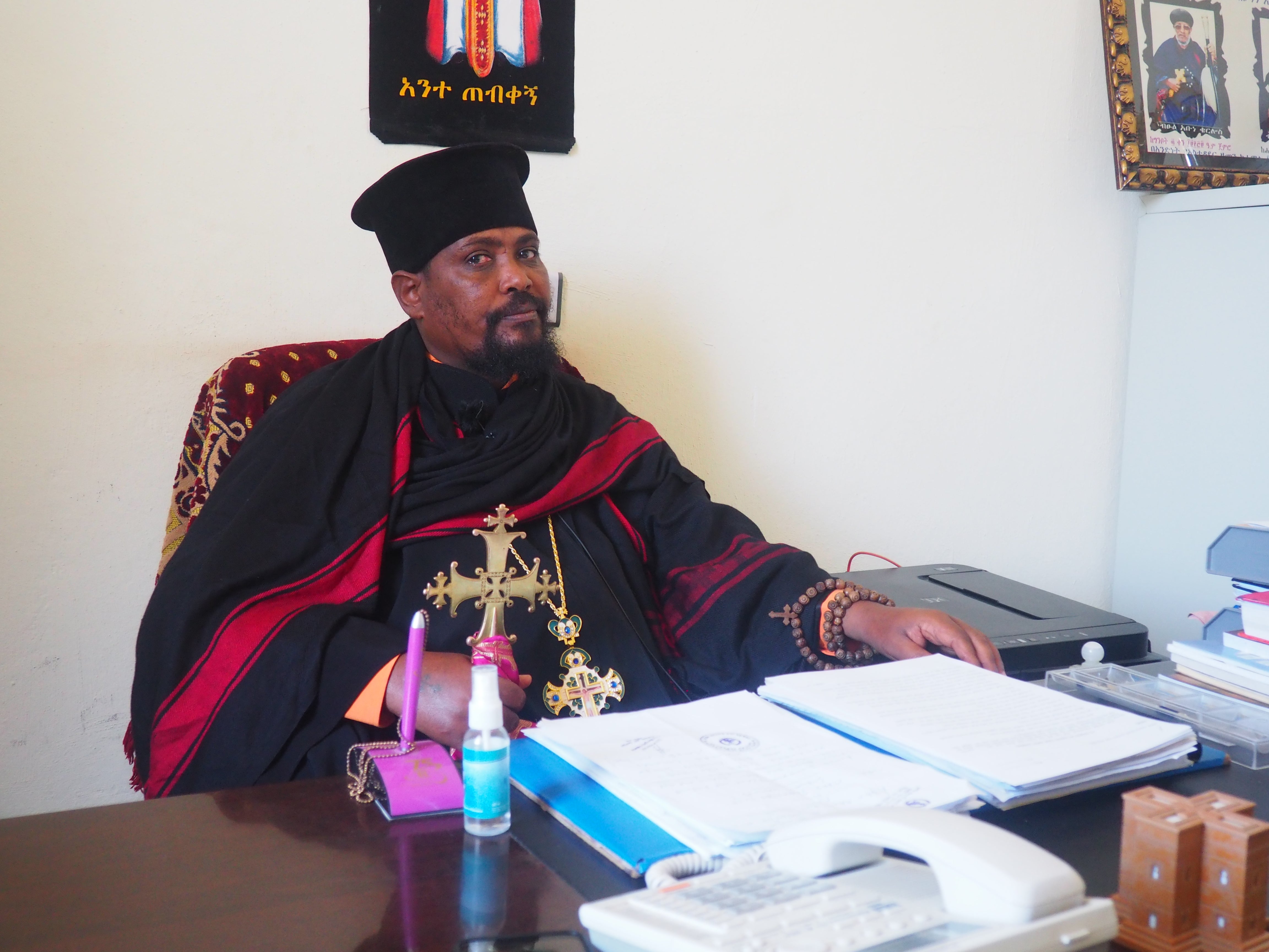 Lalibela’s archbishop Tsige Mezgebu poses for a picture during an interview with The Independent in northern Ethiopia, 27 January 2022