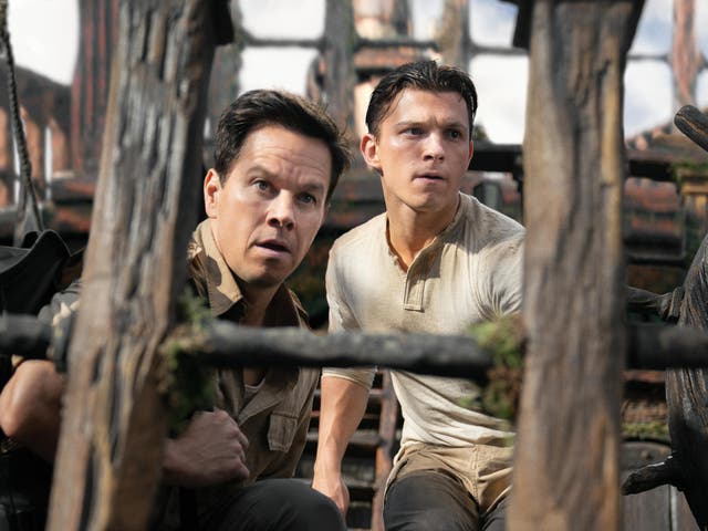 <p>Mark Wahlberg and Tom Holland in ‘Uncharted'</p>