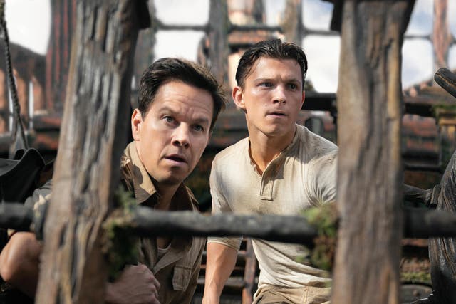 <p>Mark Wahlberg and Tom Holland in ‘Uncharted'</p>