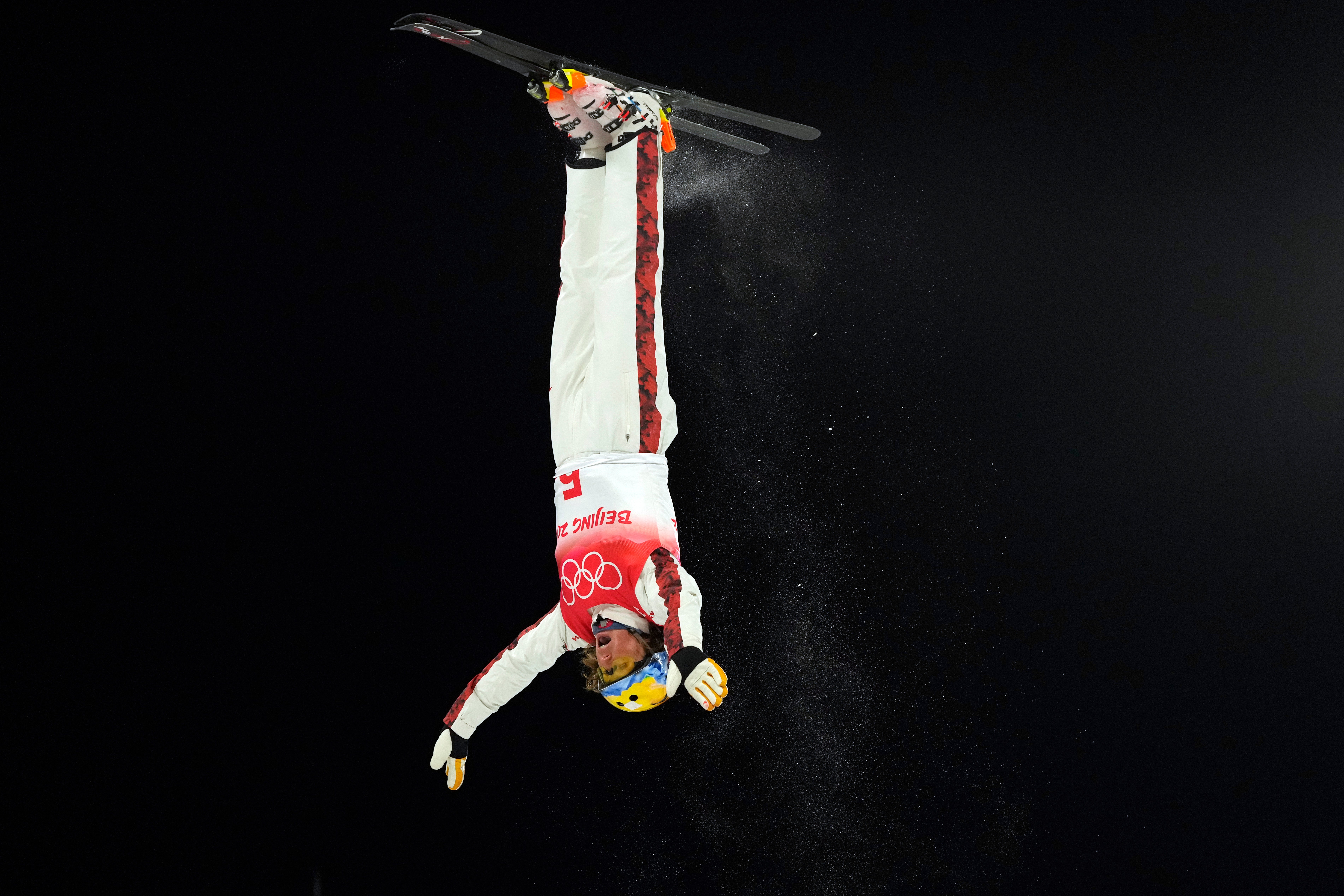 Canada’s Marion Thenault competes during the mixed team aerials finals (Francisco Seco/AP)