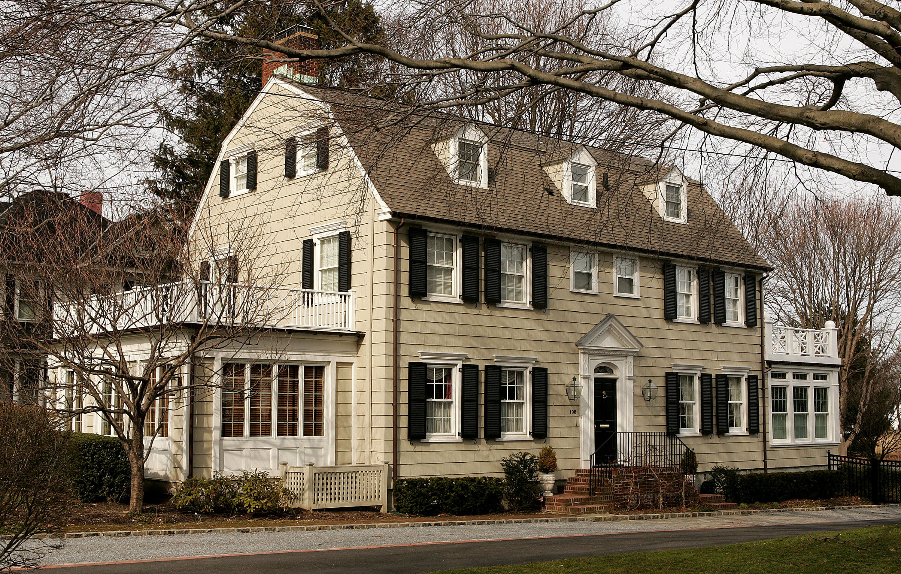 The Watcher home had eerie similarities to the infamy of another Dutch colonial just 60 miles east - the Amityville Horror House on Long Island, which also sparked international interest for its creepy story