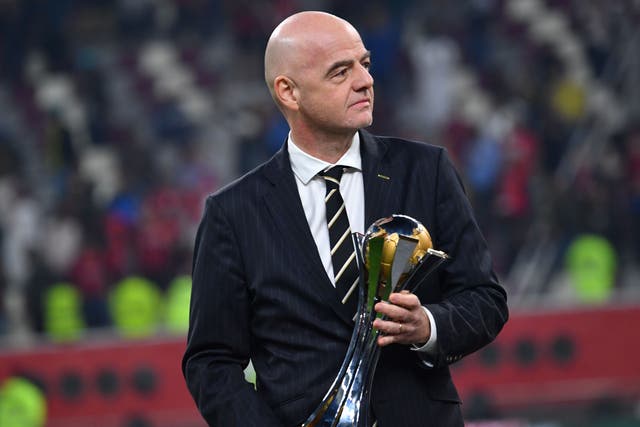 <p>Fifa president Gianni Infantino with the Club World Cup trophy </p>