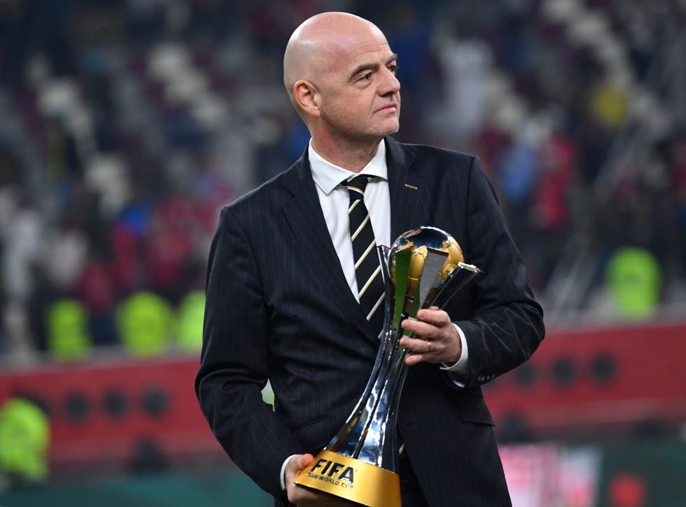 <p>Fifa president Gianni Infantino with the Club World Cup trophy </p>