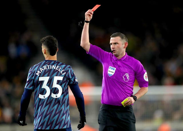 Arsenal’s Gabriel Martinelli is shown a red card by referee Michael Oliver (Bradley Collyer/PA).