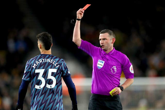 Arsenal’s Gabriel Martinelli is shown a red card by referee Michael Oliver (Bradley Collyer/PA).