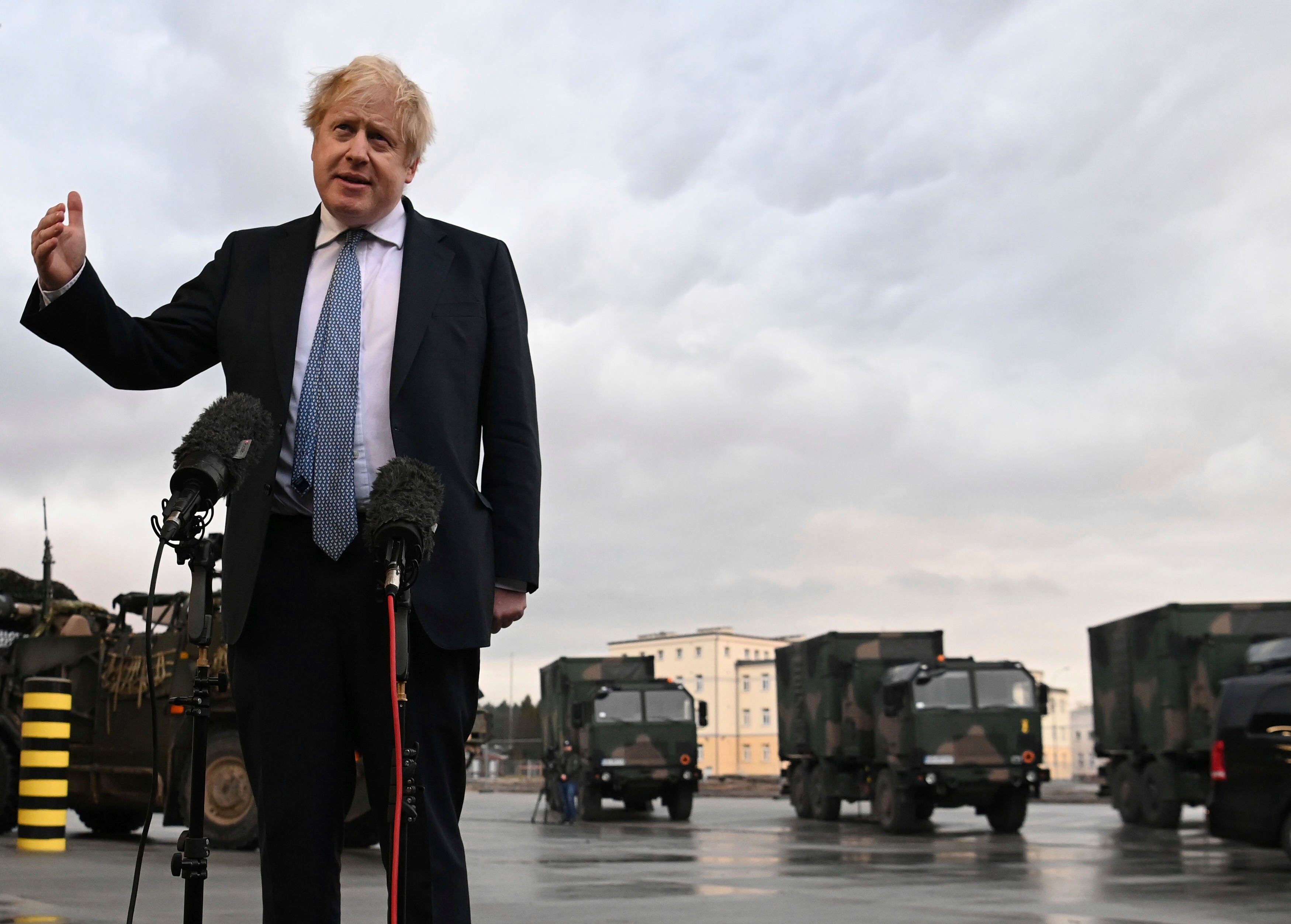 Boris Johnson talks to the media at a military base in Poland last week