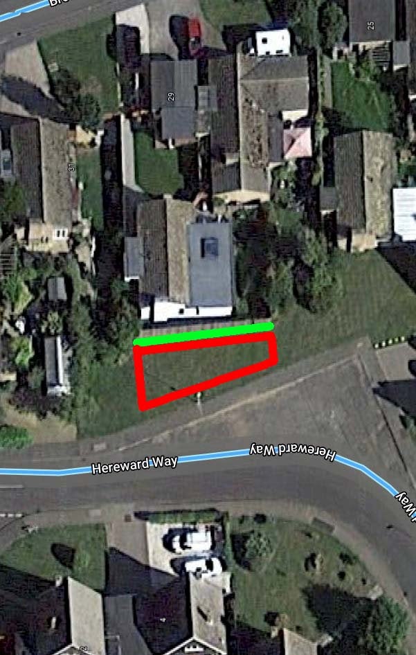 Google Maps image showing Lee and Kirstie Lawes's home. The green line shows the position of their original fence - the red area is their land which they fenced off