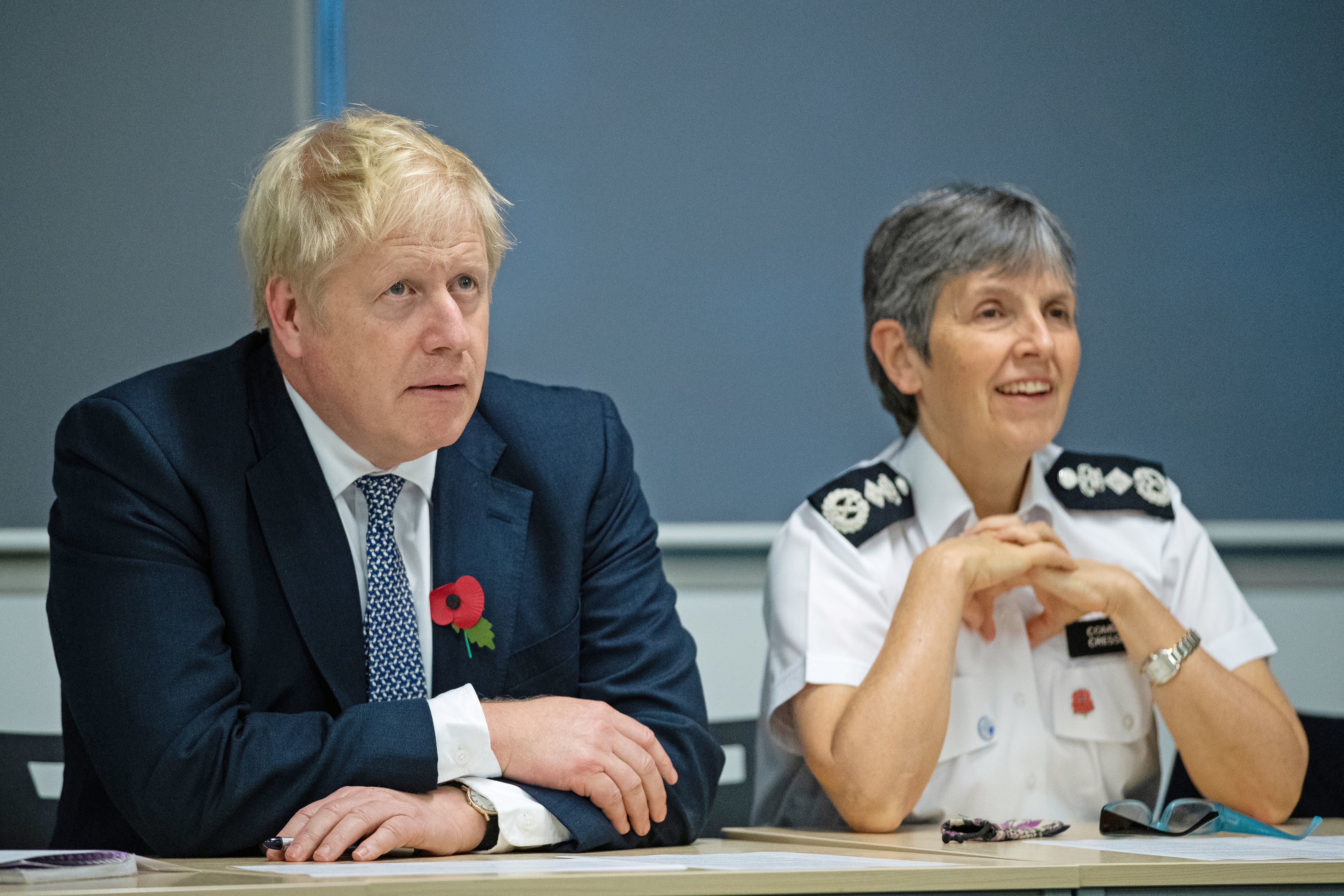 Boris Johnson pictured next to former Met Police commissioner Cressida Dick