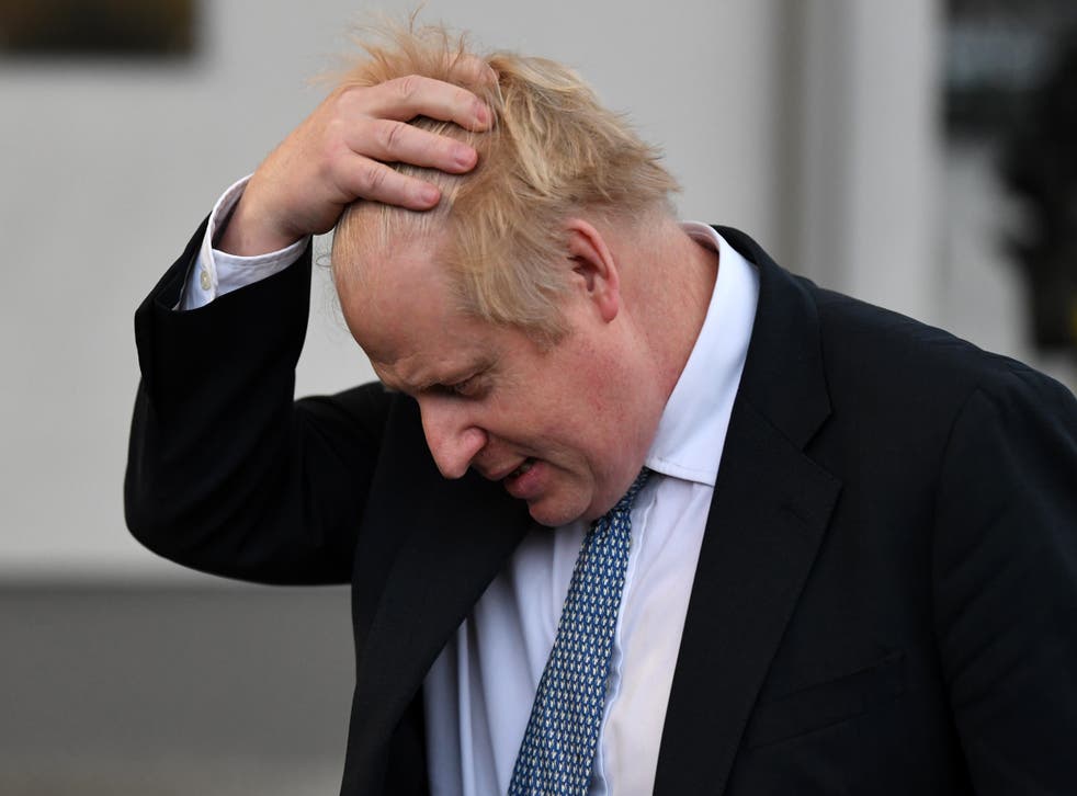 Boris Johnson receives his legal questionnaire from police (Daniel Leal/PA)