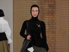 Bella Hadid turns heads at NYFW in velvet peplum jumper in Proenza Schouler show