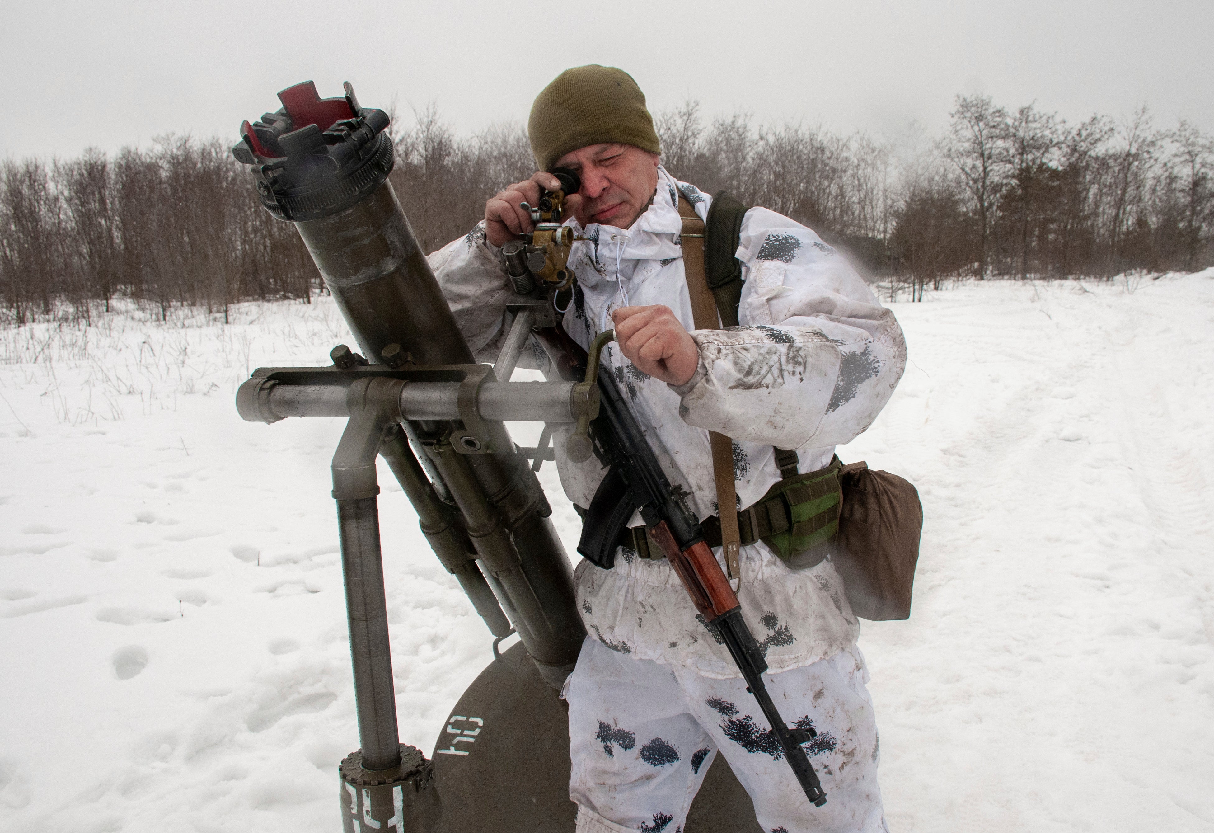 A Ukrainian soldier trains during military drills close to Kharkiv, Ukraine (Andrew Marienko/AP)