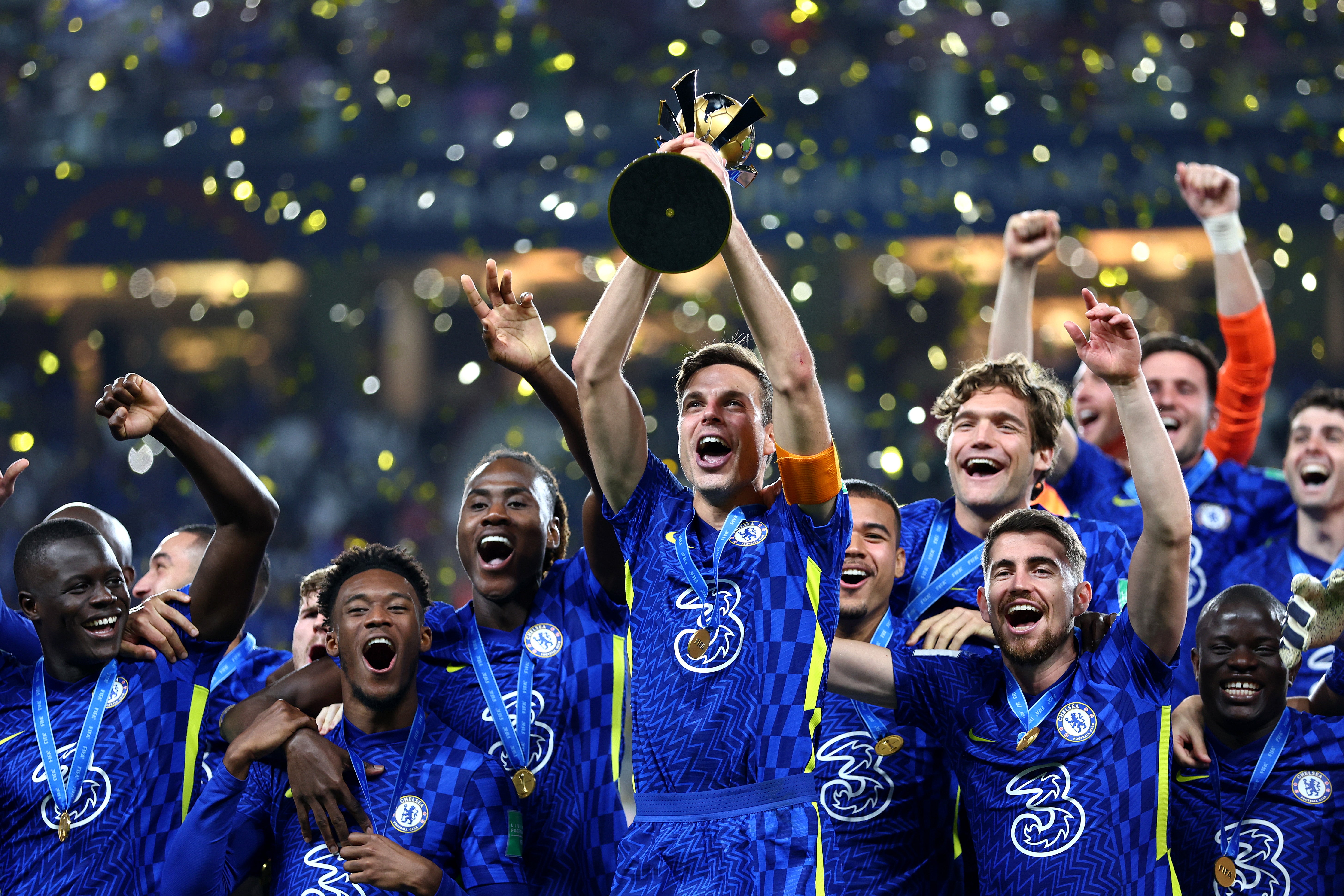 Cesar Azplicaceuta lifts the trophy as Chelsea became world club champions for the first time