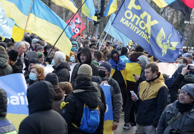 <p>Participants with Ukraine's flags attend a ‘March of Unity for Ukraine’, amid warnings of Russian invasion, in Kiev, Ukraine on February 12, 2022 </p>