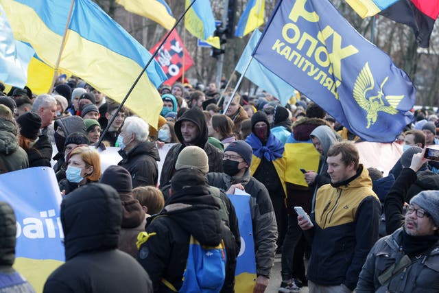 <p>Participants with Ukraine's flags attend a ‘March of Unity for Ukraine’, amid warnings of Russian invasion, in Kiev, Ukraine on February 12, 2022 </p>