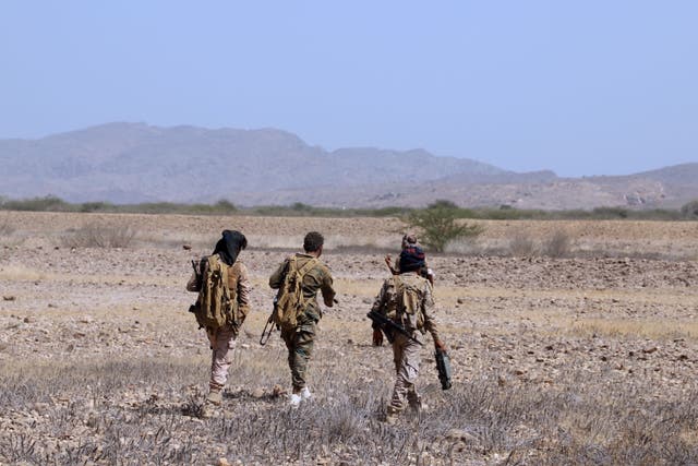 <p>File: Yemeni pro-government fighters man a position near al-Muhsam camp during fighting to drive  the pro-Iran Houthi rebels from the area of Harad, in Yemen</p>