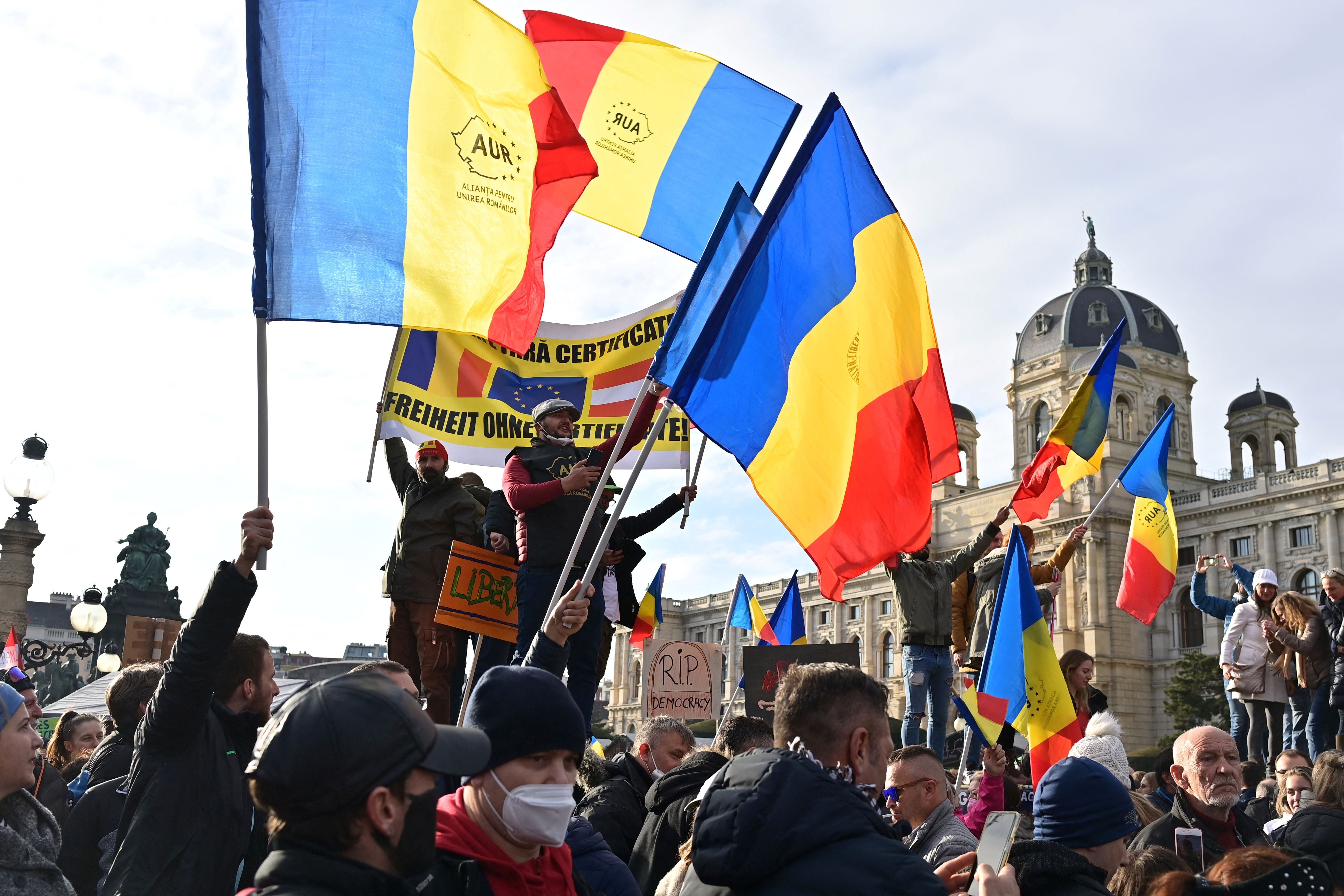 Demonstrators wave AUR flags during a rally held by Austria’s far-right Freedom Party FPOe in Vienna, Austria