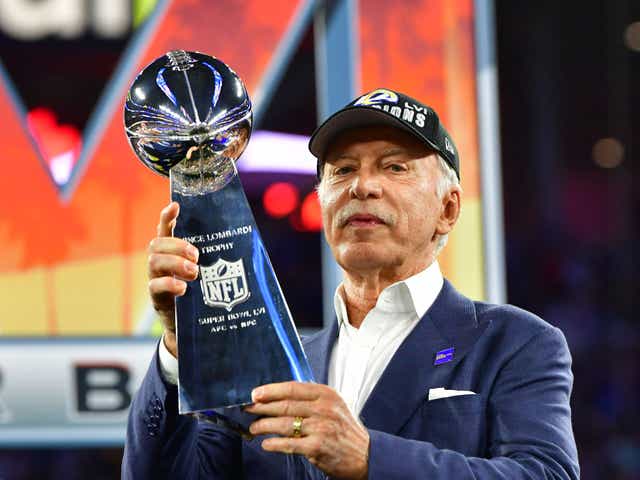 <p>Los Angeles Rams' owner Stan Kroenke holds the Vince Lombardi trophy</p>