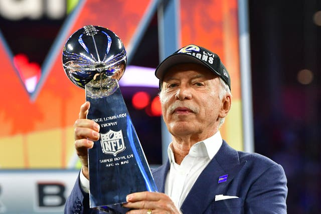 <p>Los Angeles Rams' owner Stan Kroenke holds the Vince Lombardi trophy</p>
