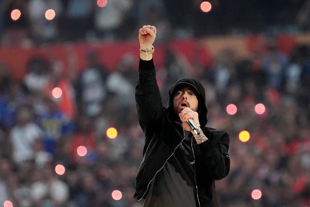 <p>Rapper Eminem performs alongside Dr Dre, Snoop Dogg, 50 Cent, Kendrick Lamar, and Mary J Blige at the Super Bowl halftime show on 13 February </p>
