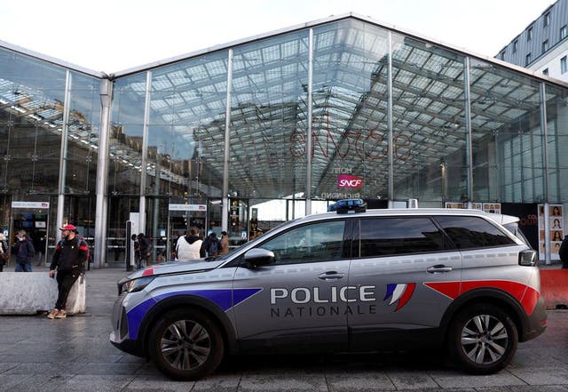 <p>Police outside Gare du Nord station after officers were attacked </p>