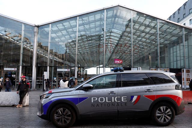 <p>Police outside Gare du Nord station after officers were attacked </p>