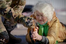 Ukraine citizens from 79 year-old great grandmother to children take up arms as Russia war fears grow