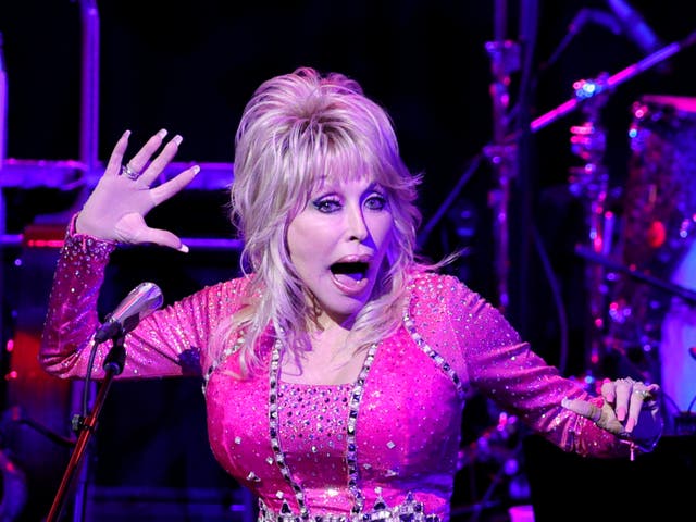 <p>Dolly Parton performing in October 2021</p>